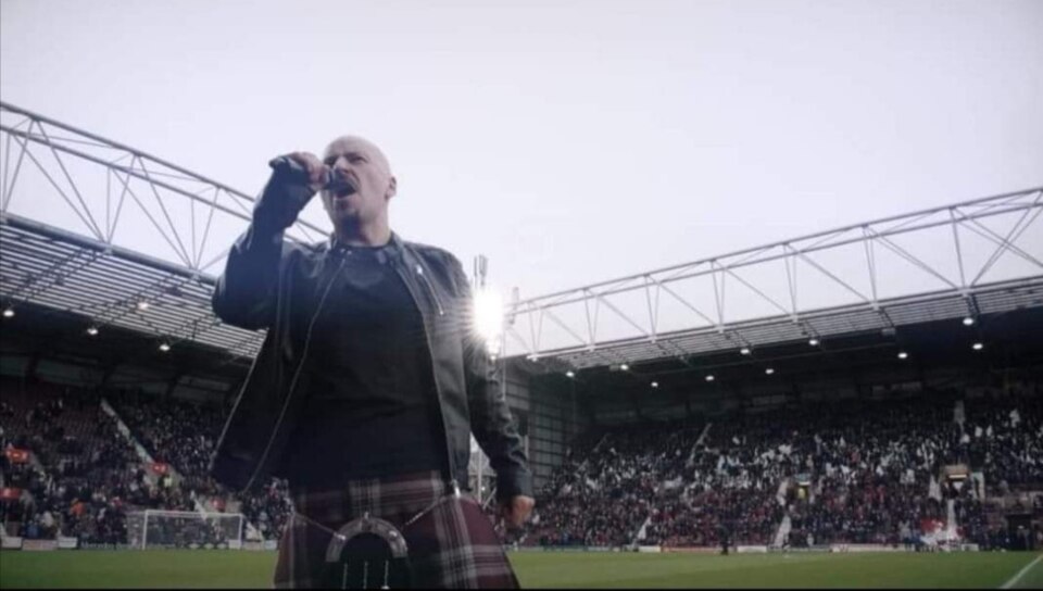 Grant performing his Heart Of Midlothian FC anthem at Tynecastle Stadium in 2019.