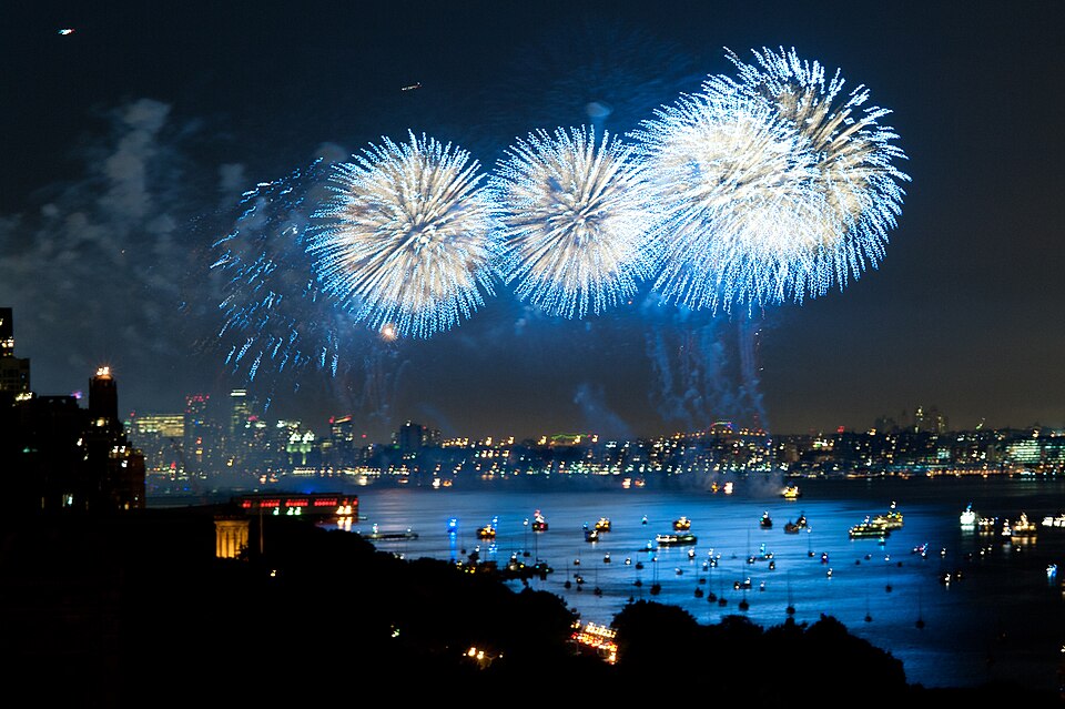 Blue fireworks over the Hudson River, as viewed from 370 Riverside Drive.