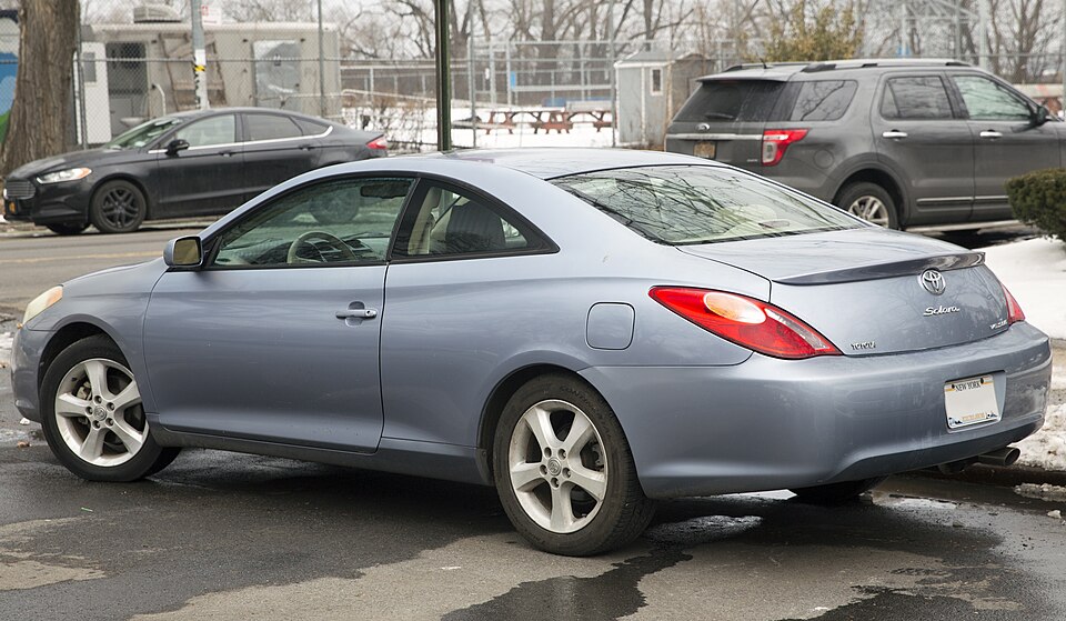 2006 Toyota Camry Solara V6 SLE (coupe) in Cosmic Blue metallic (8Q5). 3.3-liter V6, built in Georgetown, Kentucky.