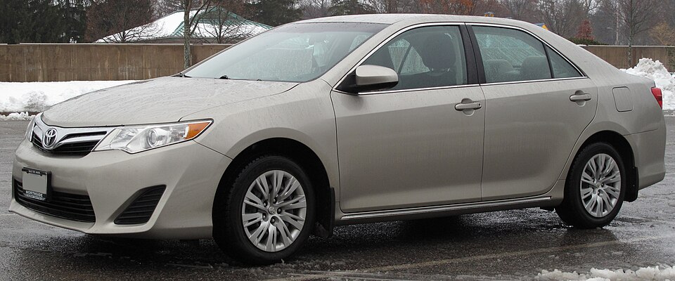 2013 Toyota Camry LE photographed in Sault Ste. Marie, Ontario, Canada. 2.5L 2AR-FE I4, 6-speed automatic. Assembled in Georgetown, Kentucky, USA.