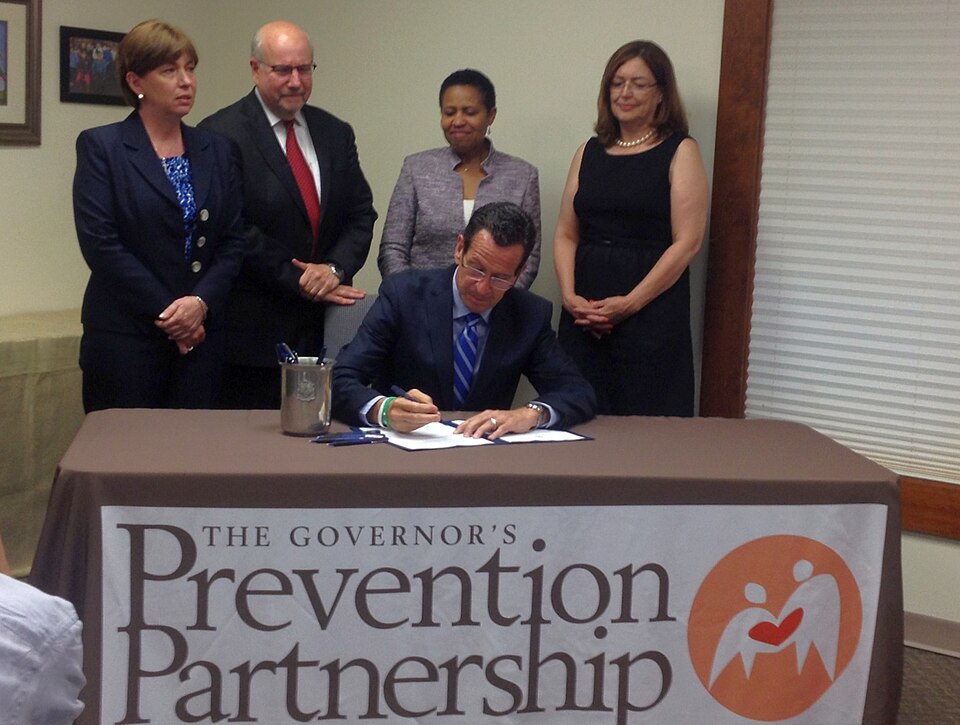 Tuesday, June 17, 2014 -- Governor Dannel P. Malloy held a bill signing ceremony in Wethersfield, where he signed legislation that grants civil and criminal liability protection to a bystander who administers Naloxone Hydrochloride (known as Narcan) in good faith to someone who has overdosed.  The n