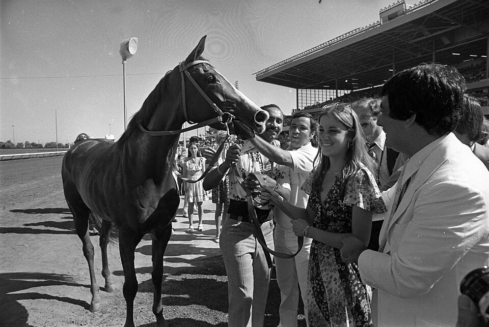 Tennis player Chris Evert meeting her namesake race horse at Hollywood Park in Inglewood, California.
