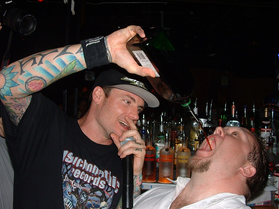 Vanilla Ice appearing at the Tex-Mex Grill in en:Baltimore, en:Maryland.The other person is John Kerr.