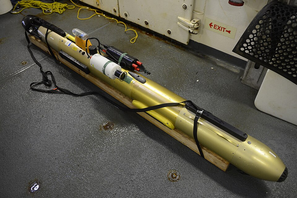 A Gavia Scientific Autonomous Underwater Vehicle dries on the deck of the Coast Guard Cutter Healy after recovery from a simulated oil in ice exercise in the Arctic Aug. 20, 2014. The AUV is outfitted with sonar and radar sensors which allow responders to locate oil trapped beneath or within the ice