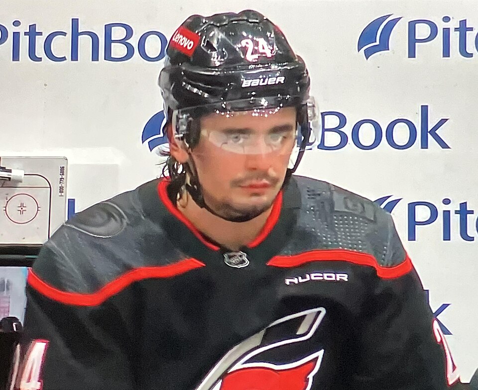 Seth Jarvis sitting on the bench during the March 19, 2024, Carolina Hurricanes at New York Islanders game.