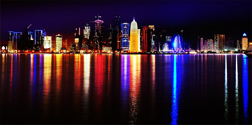 Doha, Qatar.  Skyline at night.  Showing the expansion of the business district.