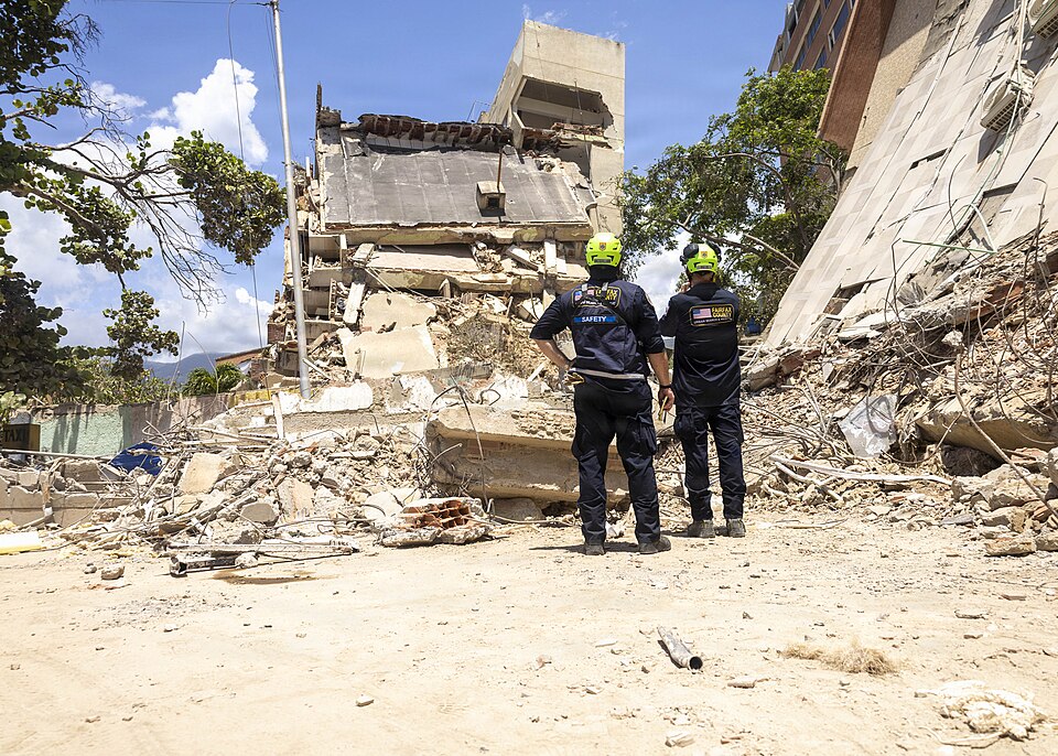 Members of the Fairfax County Urban Search and Rescue survey a disaster zone in La Guaira, Venezuela, June 29, 2026. At the direction of U.S. Southern Command, assigned U.S. military forces are supporting Department of State-led U.S. disaster assistance to the people of Venezuela in the aftermath of