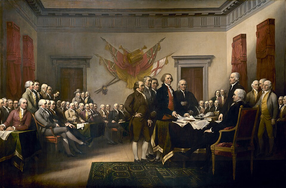 John Trumbull's painting, Declaration of Independence, depicting the five-man drafting committee of the Declaration of Independence presenting their work to the Congress. The painting can be found on the back of the U.S. $2 bill. The original hangs in the US Capitol rotunda. It does not represent a