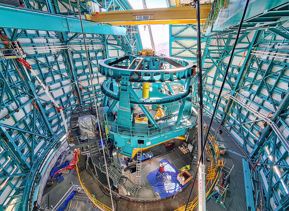 This photo of the Vera C. Rubin Observatory's telescope mount assembly was taken from high up in the dome during the bridge crane installation.