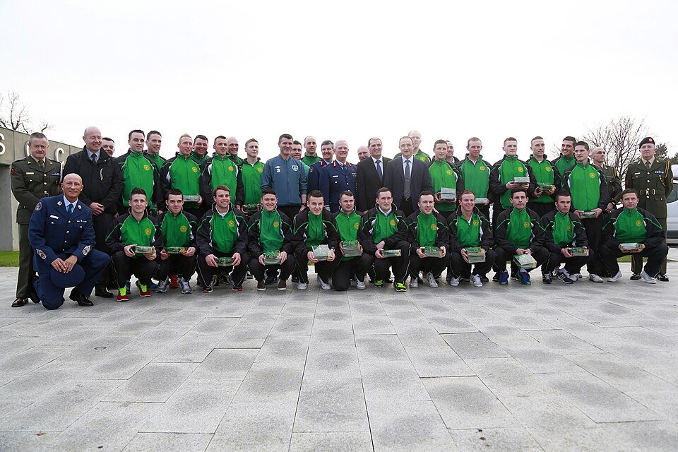 Back row 
left background 5th from left Airman Eoin o Shea from Westmeath, Cpl Michael Comerford from Kilkenny,
Cpl Darren Kelly, Dublin, Cpl Thomas Fitzgibbon,  Cork, Lt Richie Barber, Dublin
10th in front beside Roy Keane is Cpl Phily Gorman Kildare
beside Keane wearing Civis is former Pte Richie