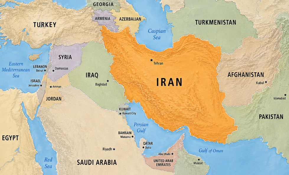 Wide political and terrain map of the Middle East highlighting Iran in orange, with surrounding countries labeled, including Iraq, Turkey, Saudi Arabia, Afghanistan, Pakistan, Turkmenistan, Azerbaijan, Armenia, Syria, Jordan, Oman, Qatar, Kuwait, Bahrain, and the United Arab Emirates.