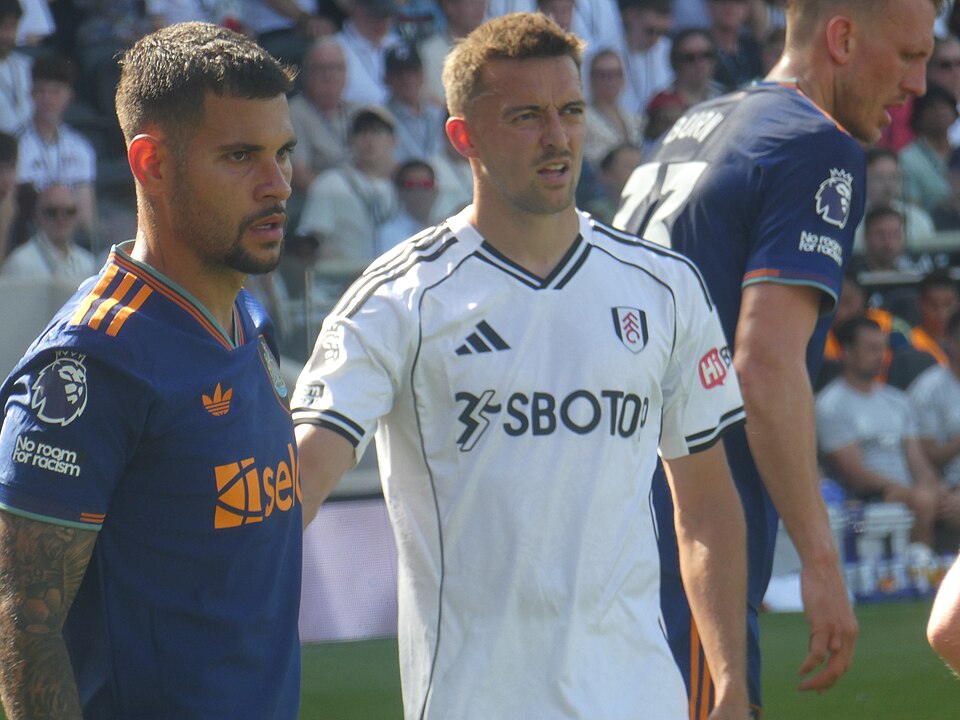 Bruno Guimarães and Timothy Castagne at position for a corner kick during the match between Fulham and Newcastle United.