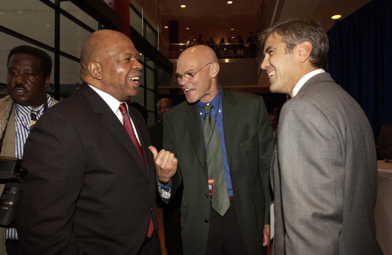 Congressman Elijah Cummings, Democratic Strategist James Carville and Actor/Producer George Clooney share a laugh after the Democratic Presidential debate at Morgan State University on September 9, 2003.