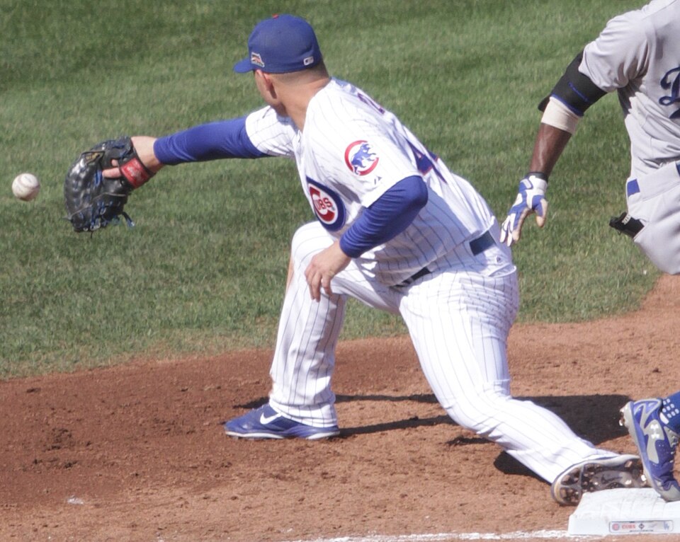 Dee Gordon gets an infield single for the 2014 Los Angeles Dodgers against the 2014 Chicago Cubs at Wrigley Field. Anthony Rizzo at first.