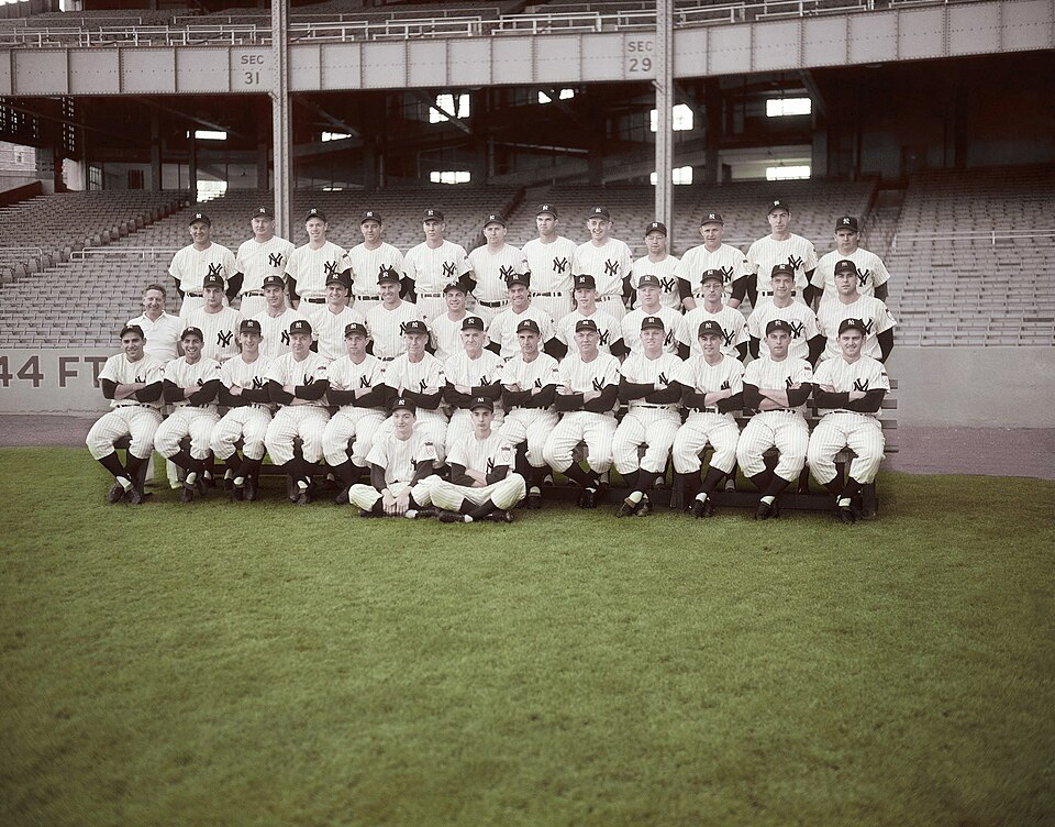 The World Series Winning 1951 New York Yankees team in a photo taken circa 1951. 
Top row, left to right: Allie Reynolds, Johnny Mize, Gil McDougald, Ernie Nevel, Bob Kuzava, Frank Shea, Johnny Sain, Tom Morgan, Clint Courtney. 
Middle row, left to right: Gus Mauch, Jim Brideweser, Archie Wilson, Je
