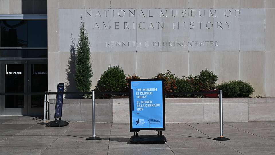 A sign in front of the National Museum of American History Kenneth E. Behring Center that says "The Museum is Closed Today". This is due to the ongoing government shutdown. 1300 Constitution Avenue NW, Washington, DC 20560.