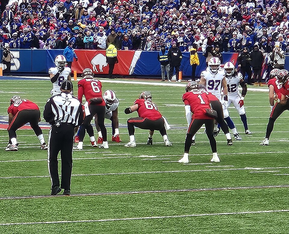 Baker Mayfield leads the Buccaneers offense out against the Bills defense