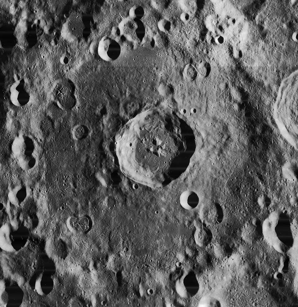Einstein, on the moon.  The larger, eroded crater filling the frame is Einstein.  The smaller crater at center is Einstein A.