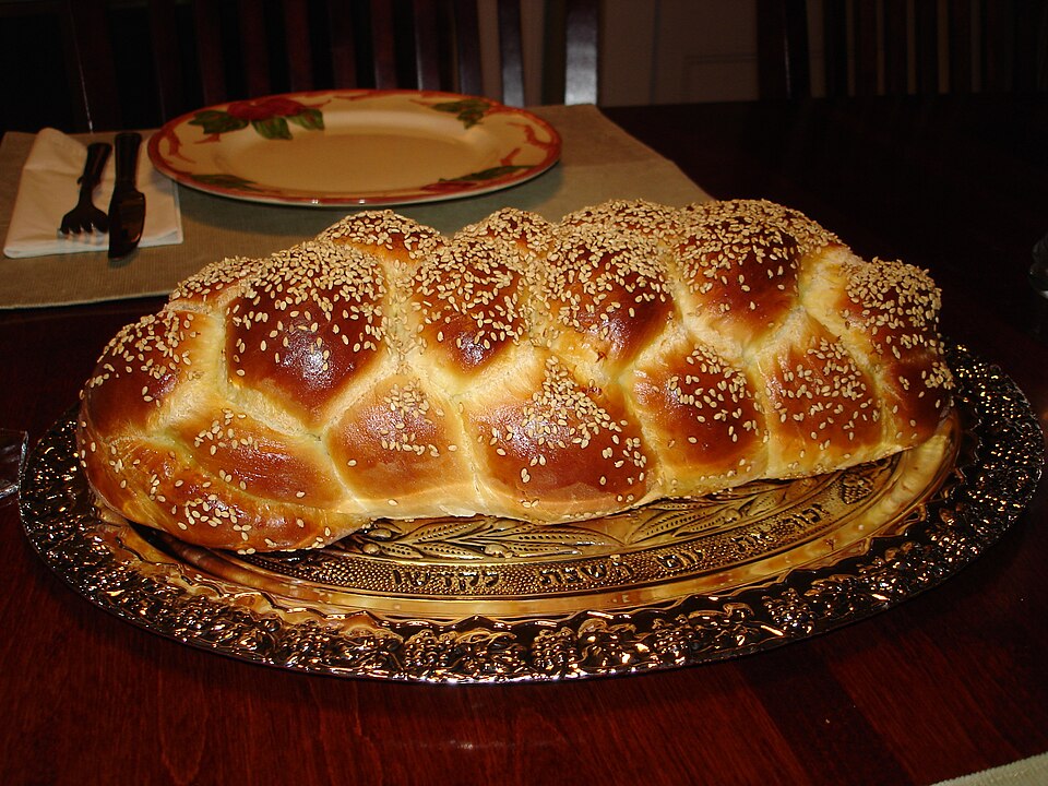 Six Braided Jewish Challah with sesame.