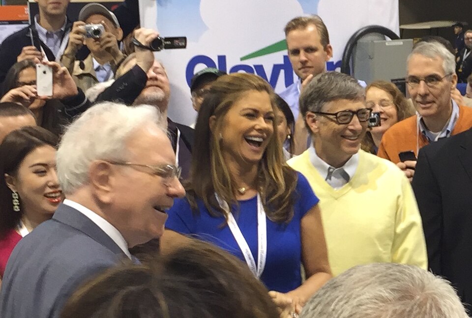 Warren Buffett, Kathy Ireland, and Bill Gates at the 2015 Berkshire Hathaway Shareholders Meeting