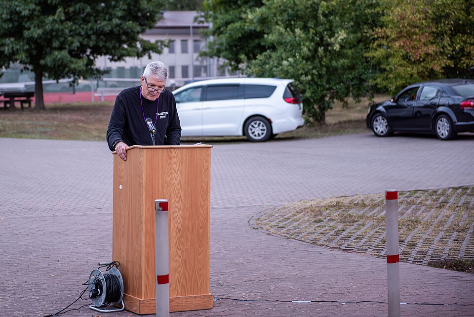 Malcolm Wolfe Jr., 86th Airlift Wing Integrated Primary Prevention Workforce coordination specialist, delivers remarks during the Hope in Motion 2 Suicide Prevention Walk at Ramstein Air Base, Sept. 2, 2025. In observance of Suicide Prevention Awareness Month, the walk served to raise awareness abou