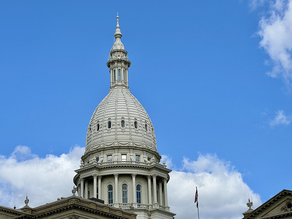 Built in 1873-1879, this Renaissance Revival-style building was designed by Elijah E. Myers for the State of Michigan to serve as the seat of the state government of Michigan, replacing an earlier capitol building in Lansing, built in 1847.  The building is clad in limestone with a central drum ring