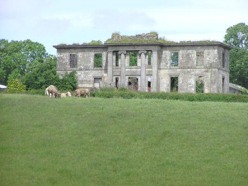 St John's Castle at Greenhill Ballygawley. Located on the A5 on the Omagh side of the town, this building is all but a shell, though the façade is intact. Owned by Sir John Marcus Stewart, BART, D.L. c.1870, Ballygawley Park was originally the Harvey home in Tullygliss. John Stewart (1757-1825) was