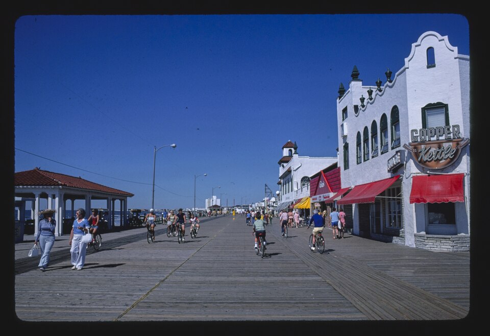 Title: Boardwalk, Ocean City, New Jersey
Physical description: 1 photograph : color transparency ;  35 mm (slide format).

Notes: Forms part of: John Margolies Roadside America photograph archive (1972-2008).; Margolies category: Atlantic coast.; General information about the John Margolies Roadside
