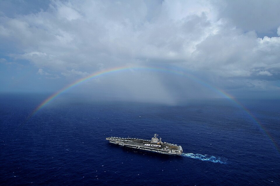 PACIFIC OCEAN (Sept. 27, 2008) The aircraft carrier USS Abraham Lincoln (CVN 72) passes under a rainbow as Sailors from Lincoln and Carrier Air Wing (CVW) 2 participate in a "flight deck spell out" while transiting the Pacific Ocean. The Abraham Lincoln Strike Group is on a scheduled deployment in t