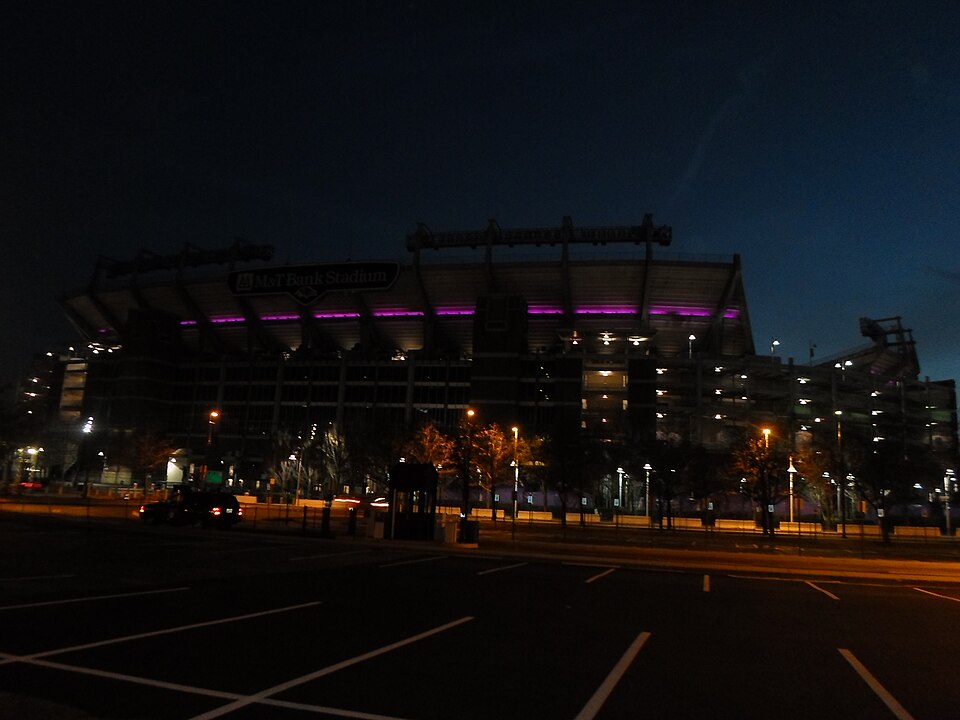 View of M&amp;T Bank Stadium at night with purple LED lighting. The stadium lighted during every Ravens playoff run, like here in the  2013 postseason which the Ravens reached their 2nd Super Bowl appearance.