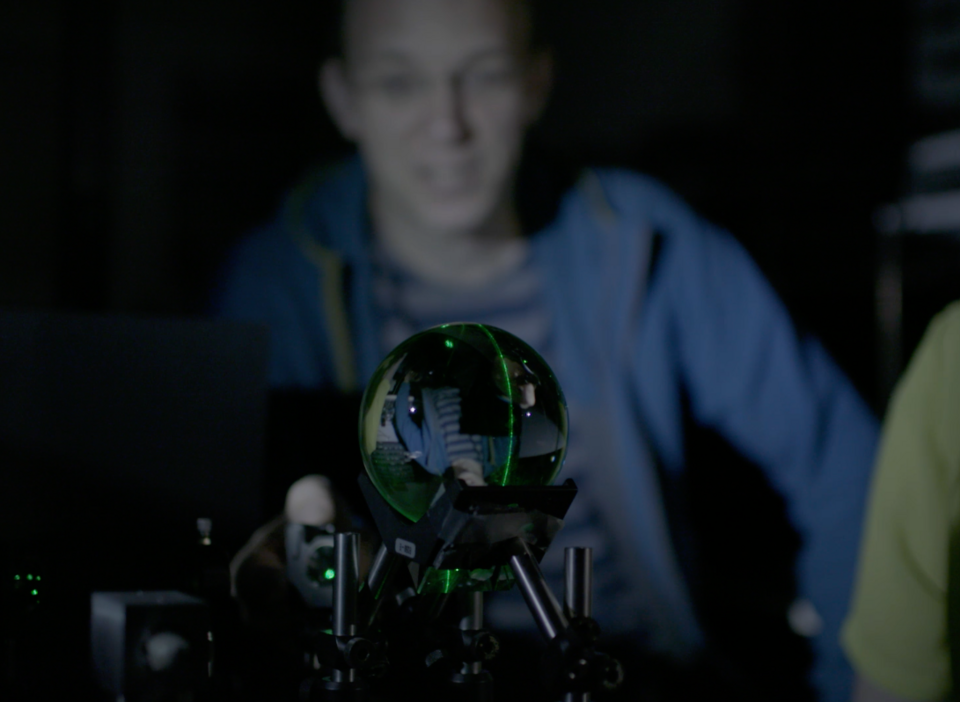 Date: April 2017
Photographer: Thievery Creative
Copyright: Dodd-Walls Centre
Where: Department of Physics, University of Otago 

Details: Dr Harald Schwefel, Principal Investigator, Dodd-Walls Centre, University of Otago demonstrates the behaviour of laser light in a crystal ball.