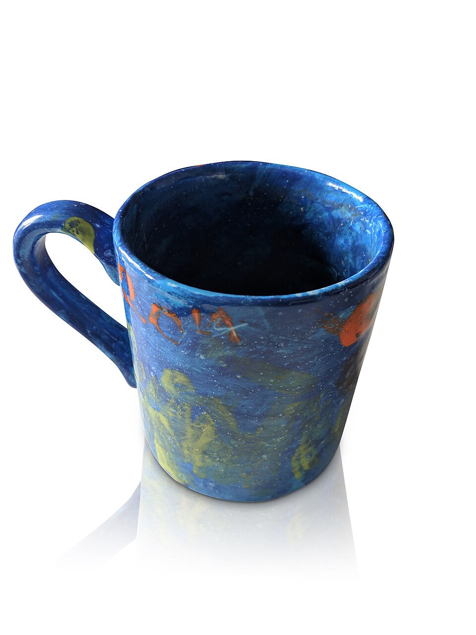 Hand painted coffee cup on white background with reflection