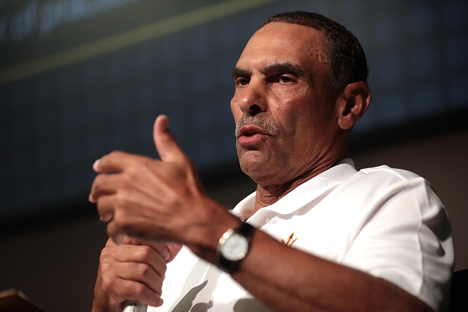 Herm Edwards speaking with attendees at an event titled "Inside the Huddle with Sun Devil Football Head Coach Herm Edwards" at the Walter Cronkite School of Journalism and Mass Communication at Arizona State University in Phoenix, Arizona.

Please attribute to Gage Skidmore if used elsewhere.