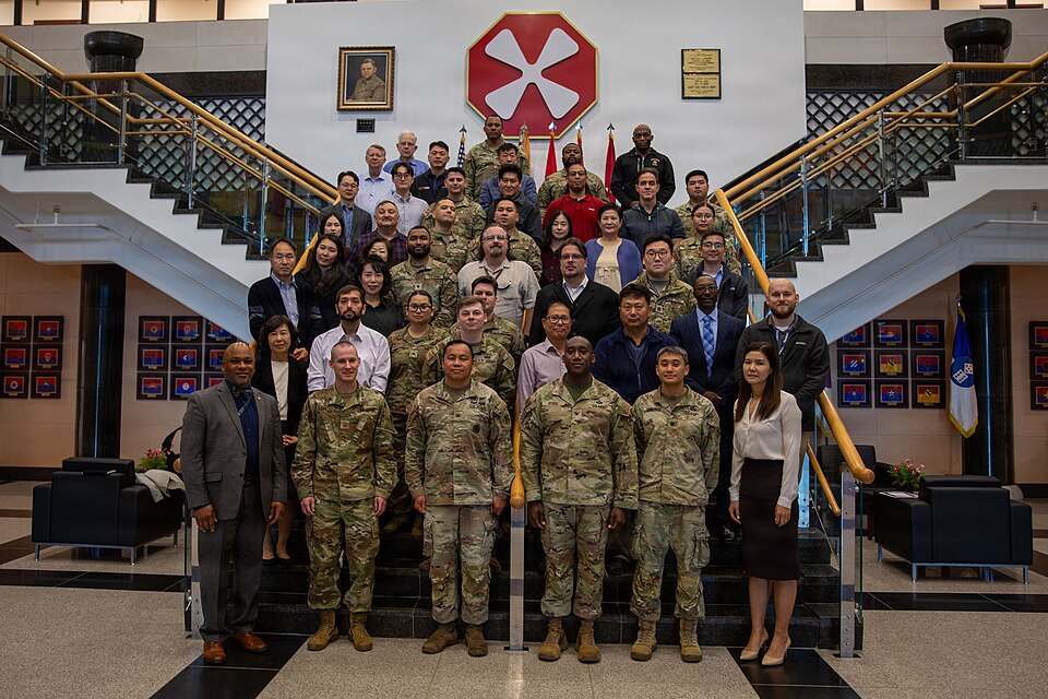 U.S. Army Soldiers assigned to Eighth Army and civilian attendees pose for a group photo after completing a cybersecurity workshop at Camp Humphreys, Republic of Korea, Oct. 20, 2025. Cybersecurity is an ever-evolving environment, and hosting workshops regularly helps keep Soldiers and civilians up