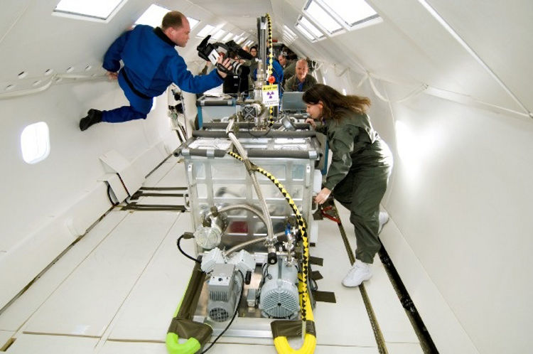 NASA engineers test the electron beam freeform fabrication (EBF3) system during a parabolic flight in 2006.