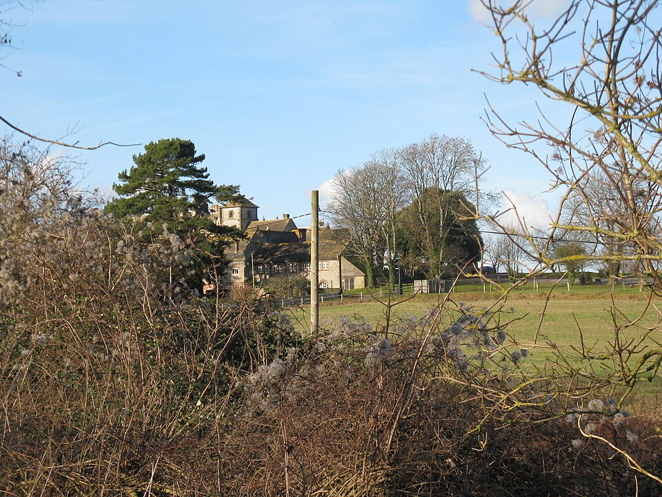 A glimpse of church by Wiston House