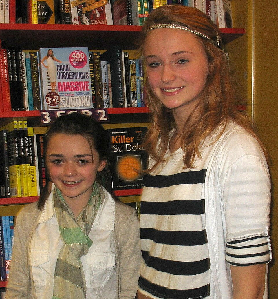 Maisie Williams (Arya Stark) and Sophie Turner (Sansa Stark) at the GRRM Easons Book signing Belfast 3rd Nov 2009, which was followed by an evening event called Moot 1 organised by the Brotherhood Without Banners (ASoIAF fandom)