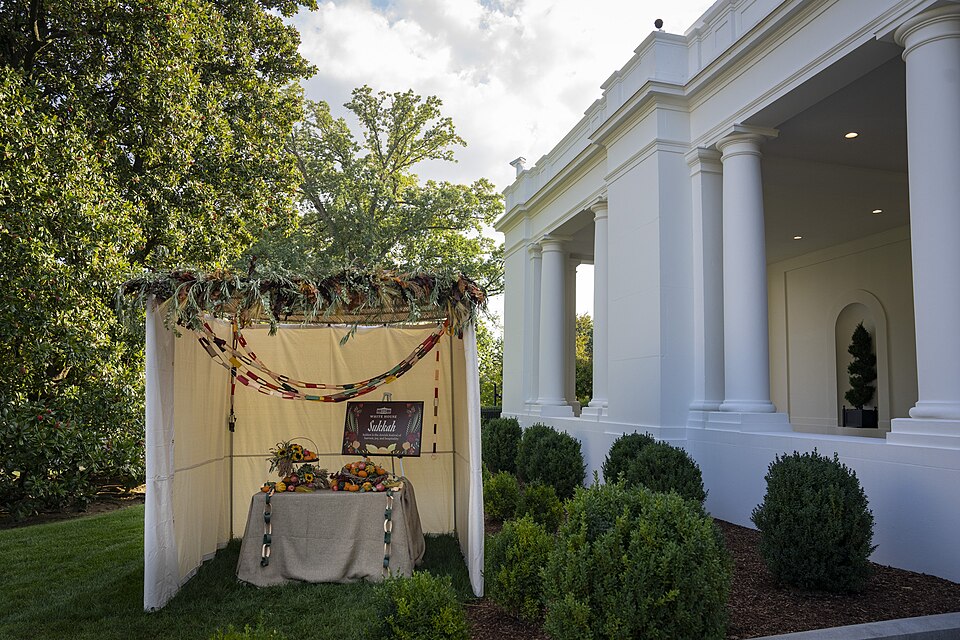 A sukkah, constructed for the Jewish festival of Sukkot, 
is situated by the East Wing entrance, Monday, October 2, 2023, at the White House.

 (Official White House Photo by Erin Scott)