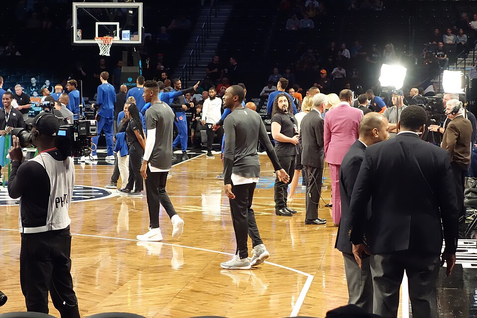 Brooklyn Nets guard Theo Pinson (center) warming up prior to the NBA Preseason game between the Brooklyn Nets and the New York Knicks at the Barclays Center on October 3, 2018. Pinson, who went undrafted in this year's NBA Draft, is on a two-way contract with Brooklyn and the Long Island Nets D-Leag
