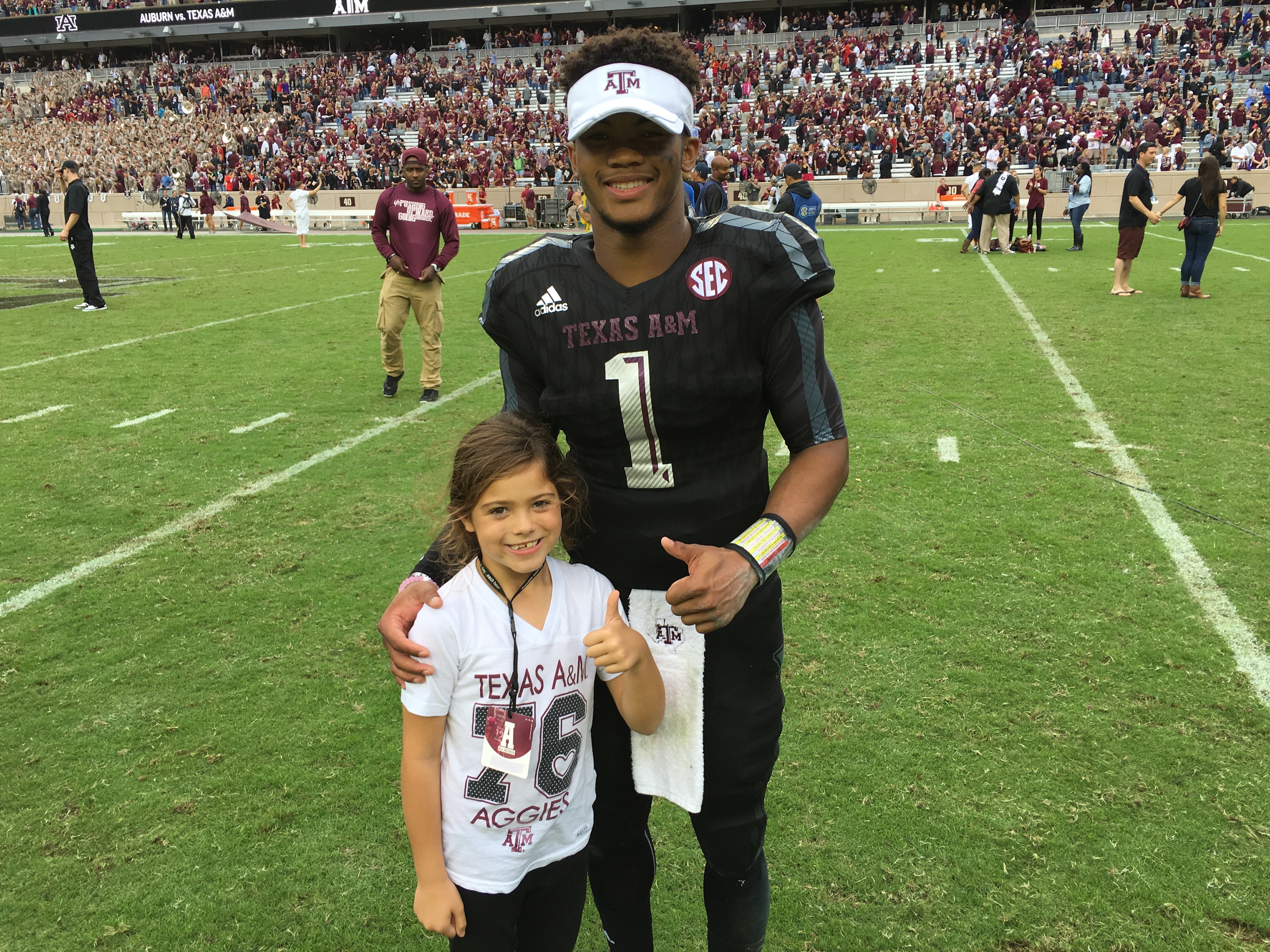 Kyler Murray with Avery Mollett after winning his first football game as starting quarterback for the Texas A&amp;M Aggies and defeating the South Carolina Gamecocks on October 31, 2015