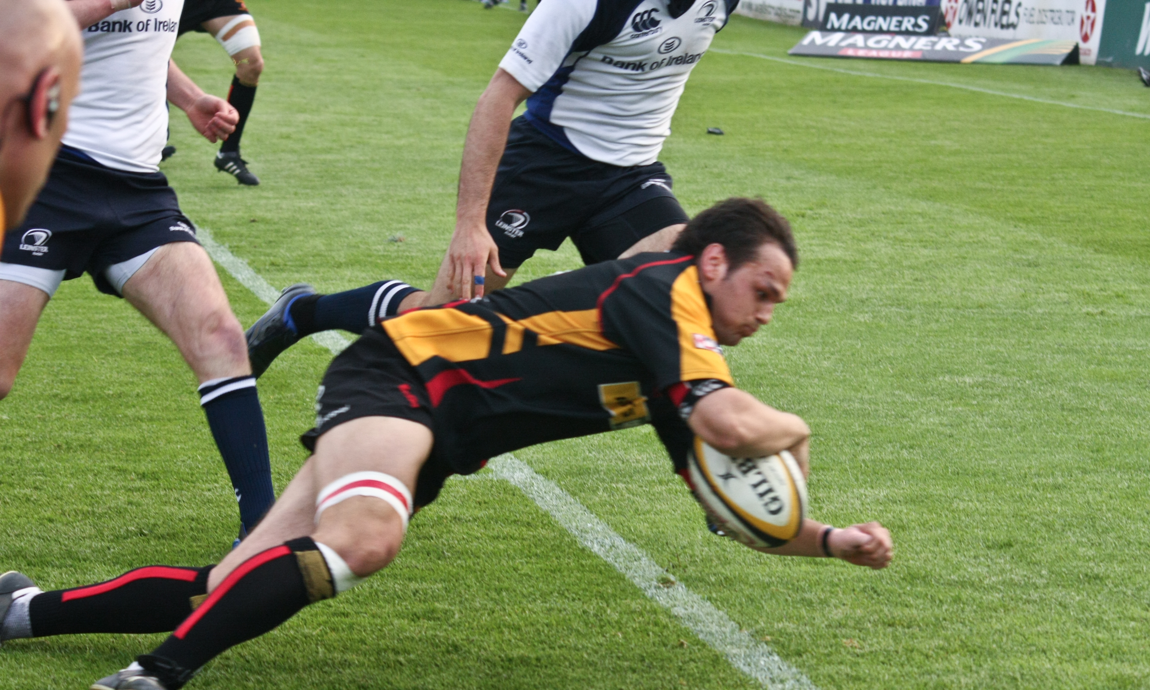 A try during a game between Newport Gwent Dragons and Leinster in the Magners League.